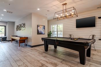 Game room at willowest in vinings apartments in atlanta, ga 30339